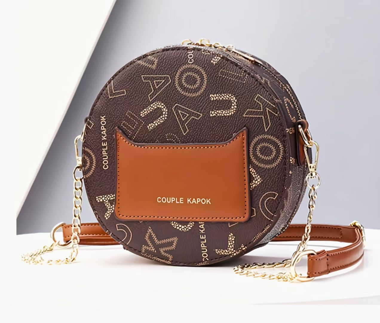 Round Crossbody Handbag for Women in Pakistan – Stylish PU Leather Bag with Cute Cat Keychain